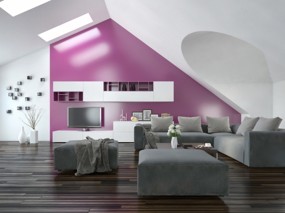 Modern living room with purple walls, wooden floors, and sun tunnel skylights in San Jose, CA.