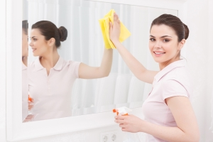 Cleaning glass mirror tips